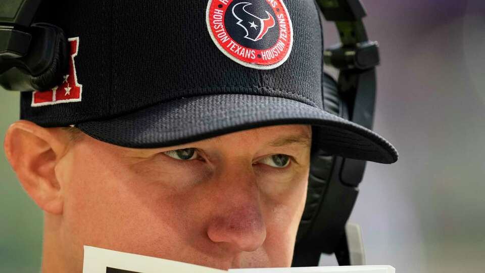 Houston Texans offensive coordinator Bobby Slowik walks up thew sidelines during the second half of an NFL football game Sunday, Sept. 22, 2024, in Minneapolis, Minn.