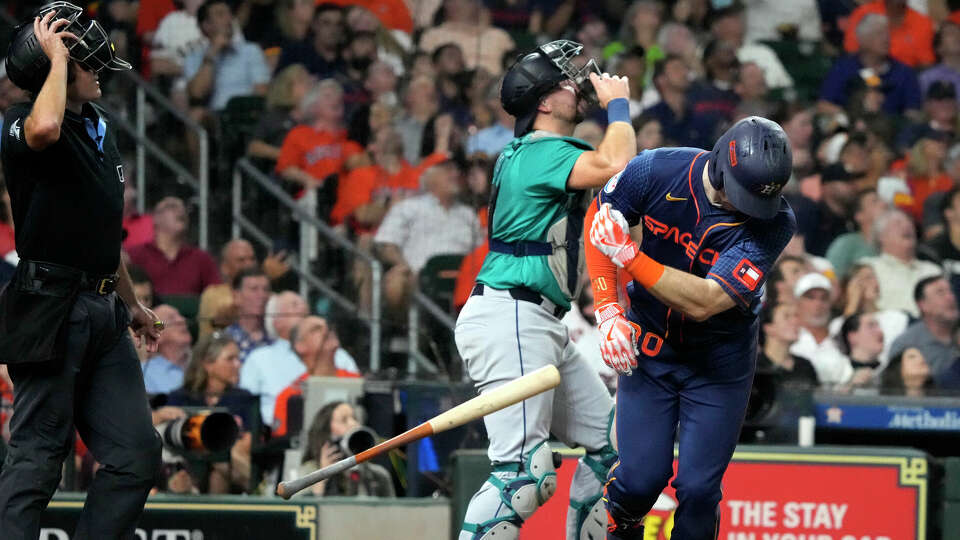 Houston Astros' Kyle Tucker (30) tosses his bat as he flew out during the sixth inning of an MLB baseball game at Minute Maid Park on Monday, Sept. 23, 2024, in Houston.