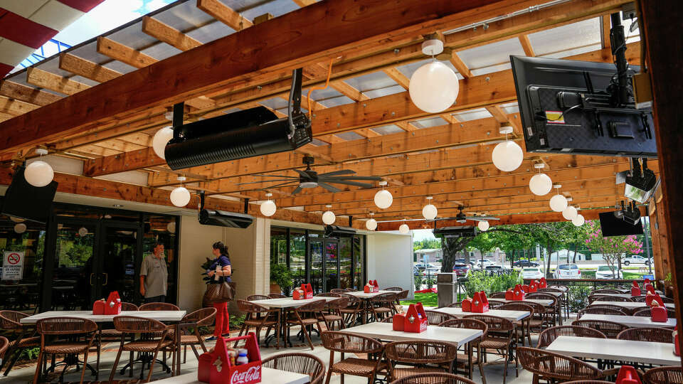 Outdoor patio of Greek restaurant chain Niko Niko's newest location in The Woodlands during the soft opening on Tuesday, June 25, 2024 in The Woodlands.