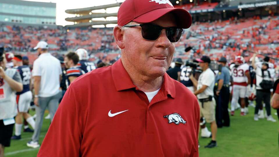 Arkansas offensive coordinator Bobby Petrino leaves the field after a win over Auburn in an NCAA college football game, Saturday, Sept. 21, 2024, in Auburn, Ala.(AP Photo/Butch Dill)