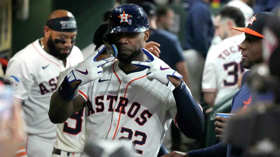 Houston Astros Jason Heyward (22) celebrates hitting a two-run home run during the fifth inning of an MLB baseball game at Minute Maid Park on Tuesday, Sept. 24, 2024, in Houston.