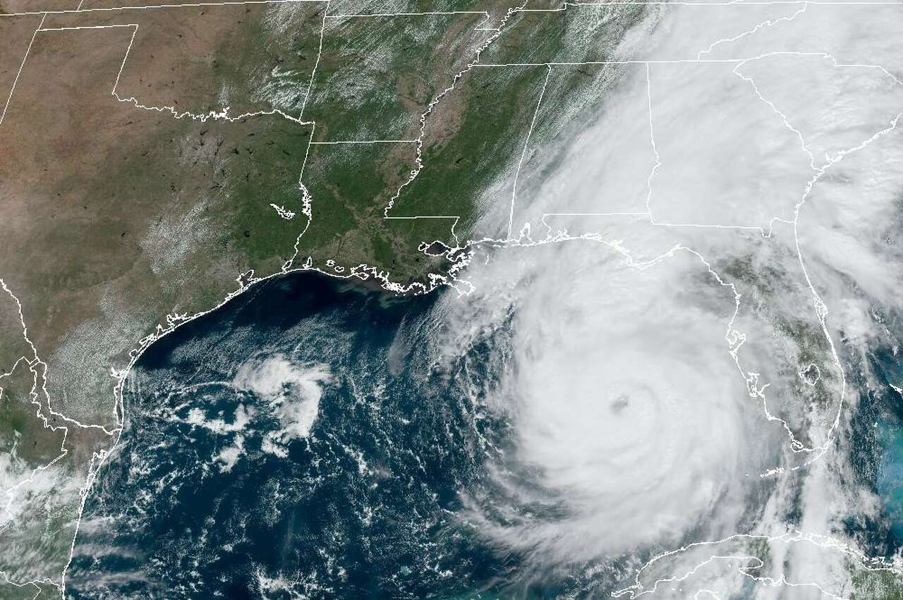 Hurricane Helene, seen in this weather satellite photo taken Thursday at noon, was barreling toward the Florida Gulf Coast.