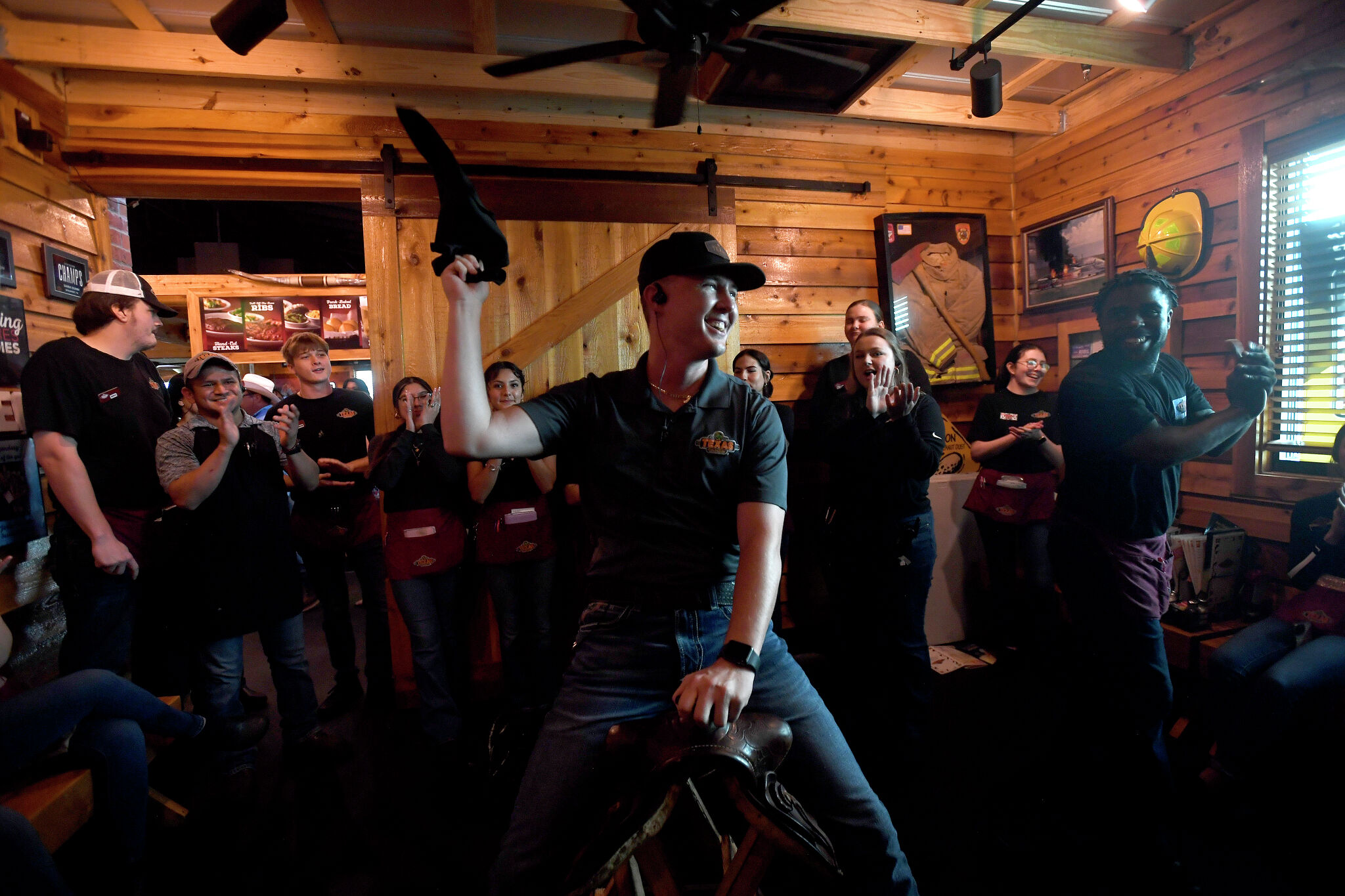 Coast Guard Reservist back by his Texas Roadhouse family