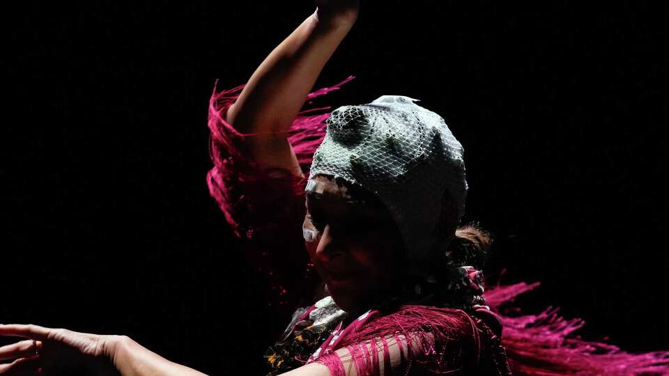 Performing artist and UH professor of dance, Gabriela Estrada, is photographed dancing during a showcase of Live EEG data (brain ?activity) at the ‘Yachay’ Event hosted by Tech 23, a Latino entertainment company for the advancement of Latino achievements in science, technology, and culture, on Saturday, Sept. 21, 2024 at The Alley Theater in Houston.