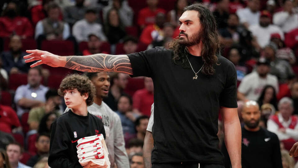 Houston Rockets center Steven Adams waves to fans during a time out in the second half of an NBA basketball game against the Los Angeles Clippers on Wednesday, March 6, 2024 in Houston.