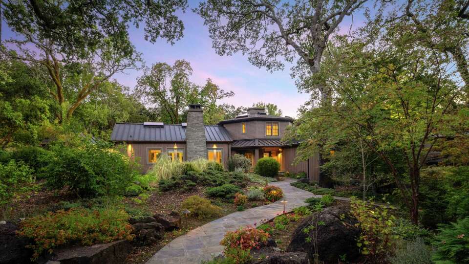 Real estate listing photos show 4100 Wake Robin Drive, a contemporary residence transformed from a private lodge. Located in Sonoma County's wine country, this historic Northern California home once occupied by writer Jack London is on the market for $4.95 million.