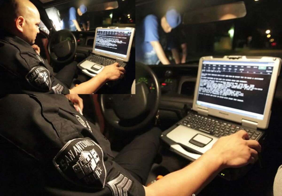 Sgt. Tom Alonzo does a background check from his in-car computer as part of the Police Department's Problem Oriented Policing unit. The new POP program also includes representatives from a number of other city services.