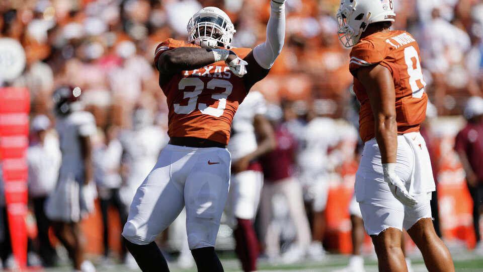 AUSTIN, TEXAS - SEPTEMBER 28: David Gbenda #33 of the Texas Longhorns celebrates after a tackle in the first half against the Mississippi State Bulldogs at Darrell K Royal-Texas Memorial Stadium on September 28, 2024 in Austin, Texas. (Photo by Tim Warner/Getty Images)