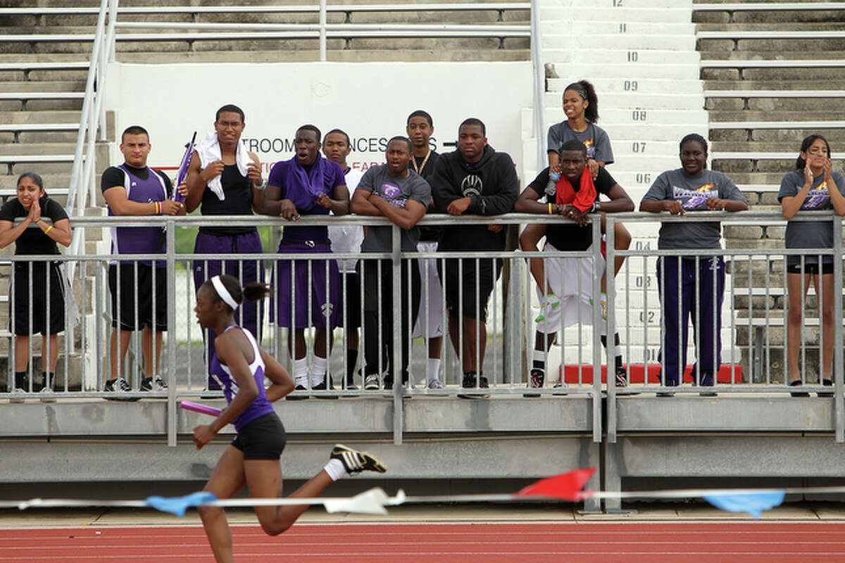 Warren students cheer on a member of their 4x4 relay team.