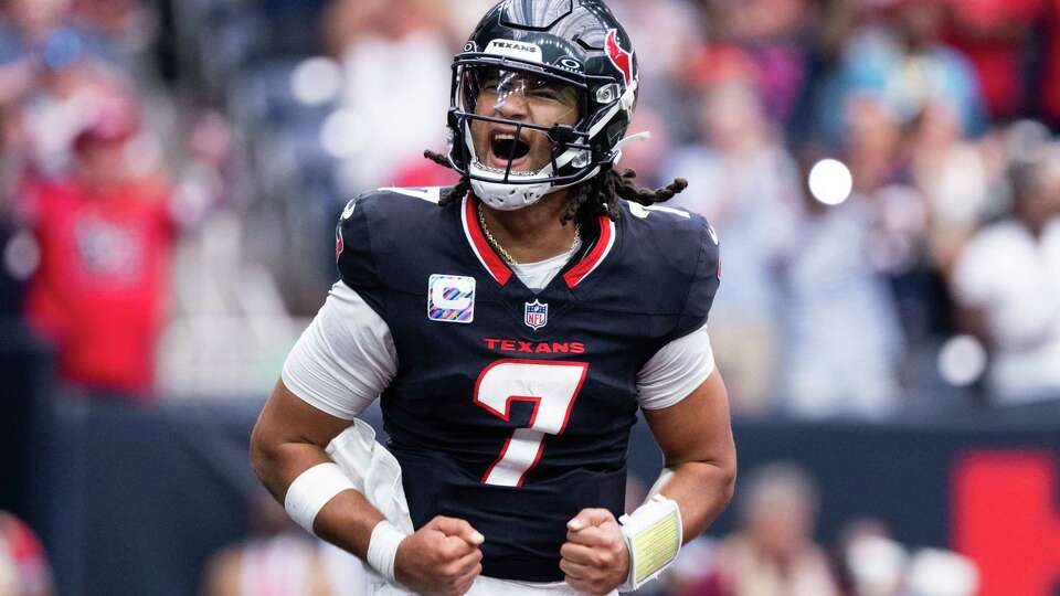 Houston Texans quarterback C.J. Stroud (7) reacts after throwing a 1-yard, game-winning touchdown pass to running back Dare Ogunbowale during the second half of an NFL football game Sunday, Sept. 29, 2024, in Houston.