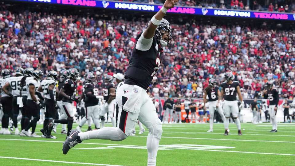 Houston Texans quarterback C.J. Stroud (7) reacts after throwing a 1-yard, game-winning touchdown pass to running back Dare Ogunbowale during the second half of an NFL football game Sunday, Sept. 29, 2024, in Houston.