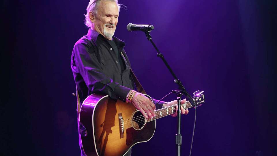 FILE - Artist and songwriter Kris Kristofferson performs 'Sunday Morning Coming Down' at the Nashville Songwriters Association International '50 Years of Songs' at the Ryman Auditorium, Sept. 20, 2017, in Nashville, Tenn. (Photo by Laura Roberts/Invision/AP, File)