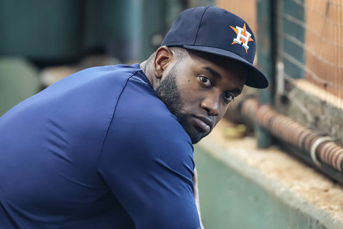 Houston Astros outfielder Yordan Alvarez (44) is in the home dugout during the MLB game between the Seattle Mariners and Houston Astros on September 25, 2024 at Minute Maid Park in Houston, Texas. 