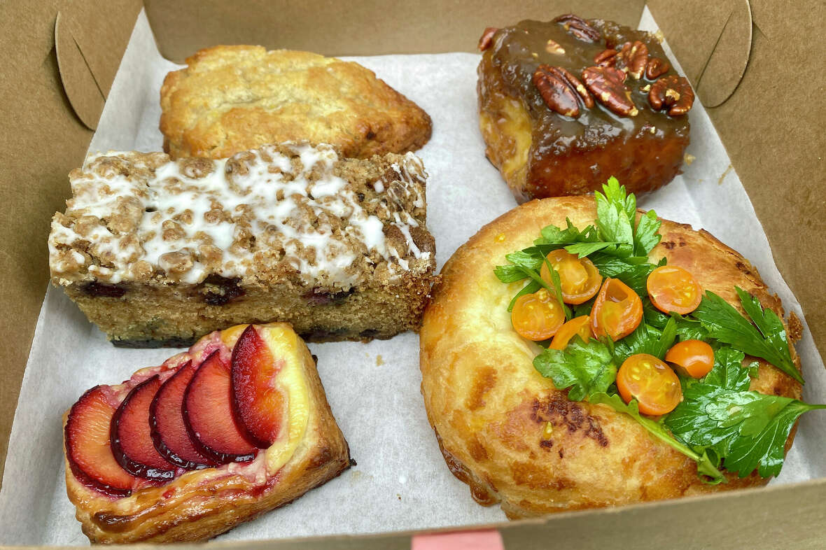 From top left, clockwise: A fig-honey scone, brioche sticky bun, Dutch crunch bun, stonefruit danish and blueberry coffee cake from Nopa in San Francisco.