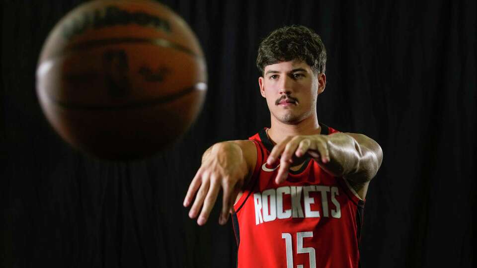 Houston Rockets guard Reed Sheppard poses for a portrait during Rockets Media Day at Toyota Center on Monday, Sept. 30, 2024 in Houston.