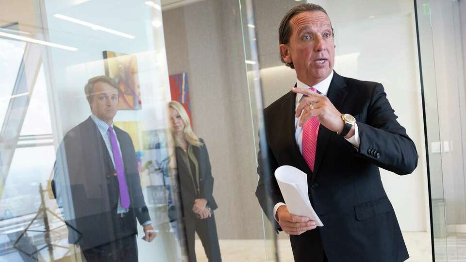 Houston lawyer Tony Buzbee answers questions after a press conference at his office announcing the over 100 individual cases he has against Sean 