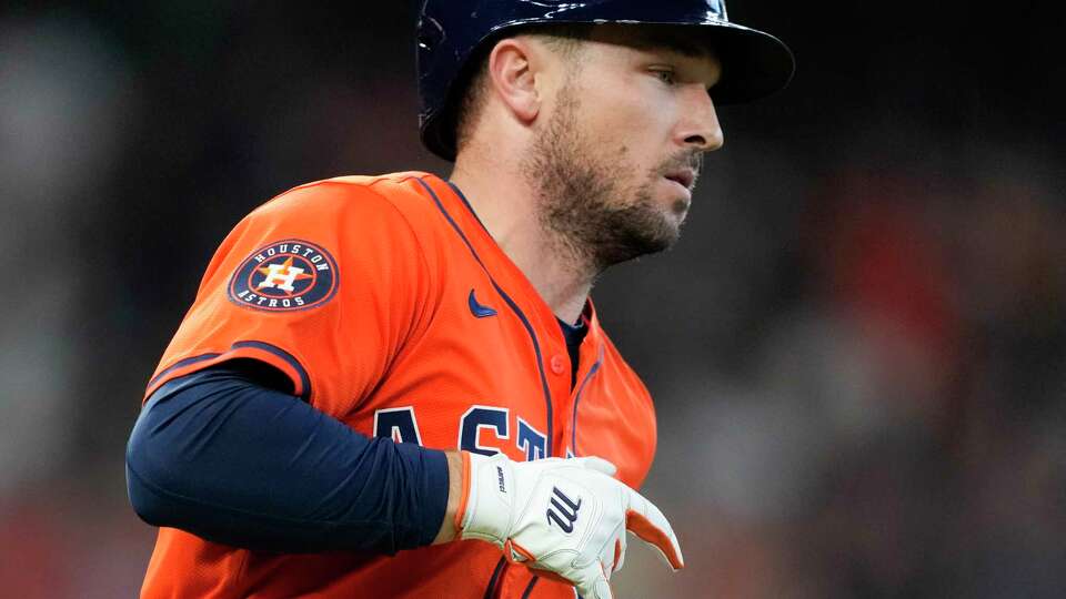 Houston Astros Alex Bregman (2) runs to first base after hitting a single in the second inning during Game 2 of the American League Wild Card Series at Minute Maid Park, Wednesday, Oct. 2, 2024, in Houston.