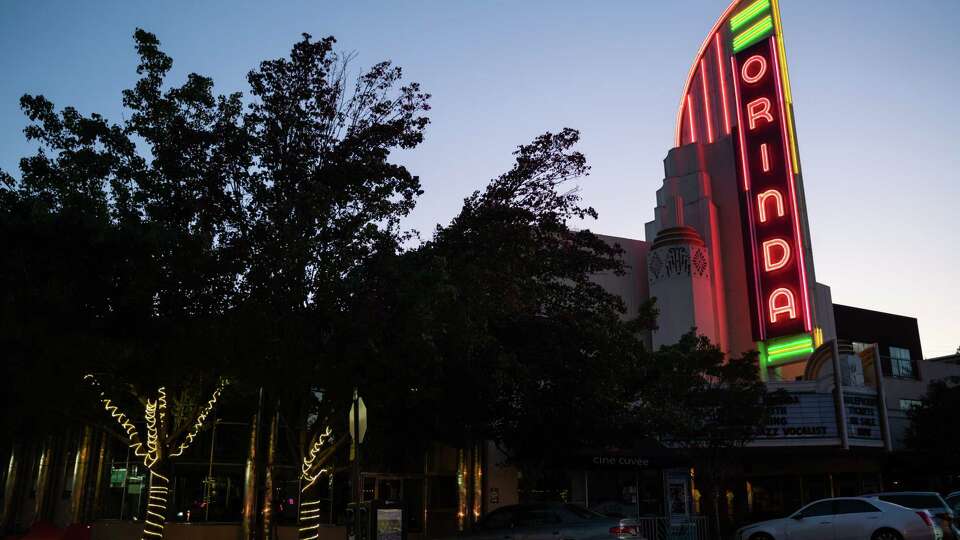 Lights on the Orinda Theater sign remain lit prior to the PG&E power outage in Orinda, Calif. on Wednesday, Oct. 9, 2019.