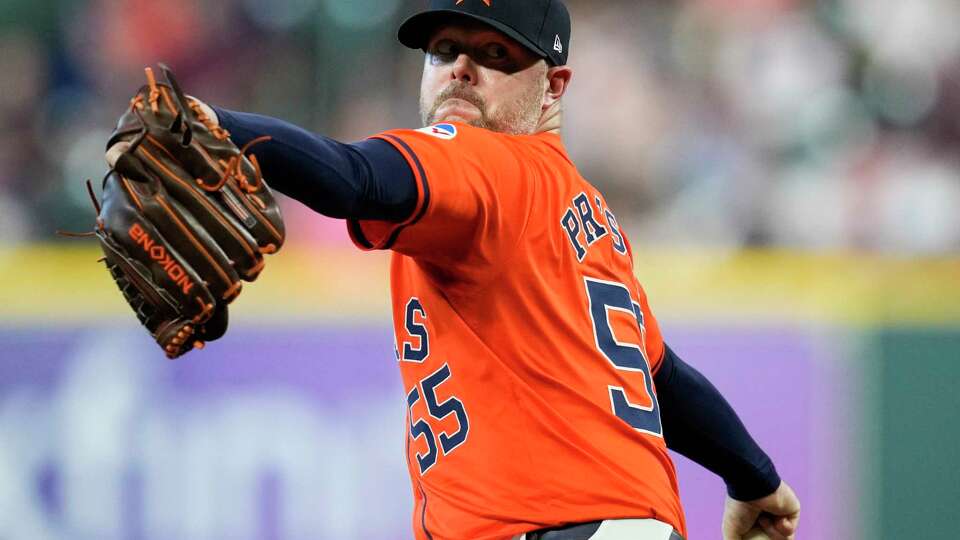 Houston Astros relief pitcher Ryan Pressly (55) delivers in the eighth inning during Game 2 of the American League Wild Card Series at Minute Maid Park, Wednesday, Oct. 2, 2024, in Houston.