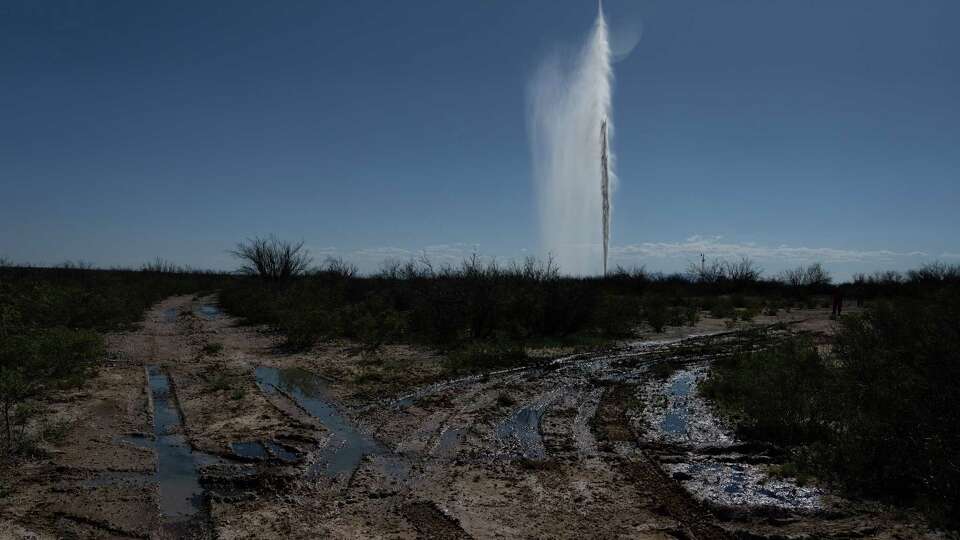 Produced water gushes out of the ground a geyser on Wednesday, Oct. 2, 2024 in Toyah, Texas. 