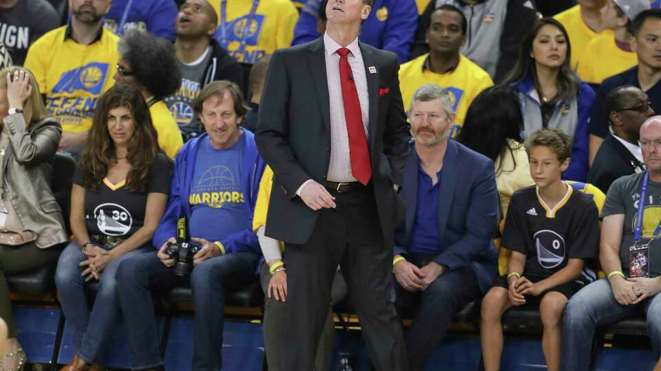 Portland Trail Blazers' Terry Stotts looks up at the scoreboard in the first quarter during Game 2 of the First Round of the Western Conference 2017 NBA Playoffs at Oracle Arena on Wednesday, April 19, 2017 in Oakland, Calif.