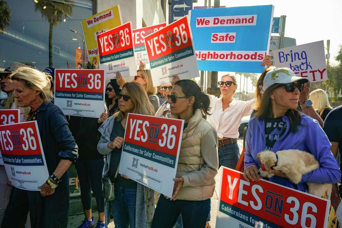 Neighbors and business owners join to support California's Proposition 36 on the November ballot at a news conference in the Venice neighborhood of Los Angeles on Monday, Sept. 30, 2024. (AP Photo/Damian Dovarganes)