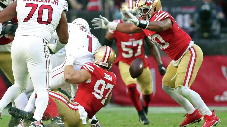 San Francisco 49ers’ Nick Bosa strip sacks Arizona Cardinals’ Kyler Murray during NFL game at State Farm Stadium in Glendale, Arizona on Sunday, December 17, 2023.