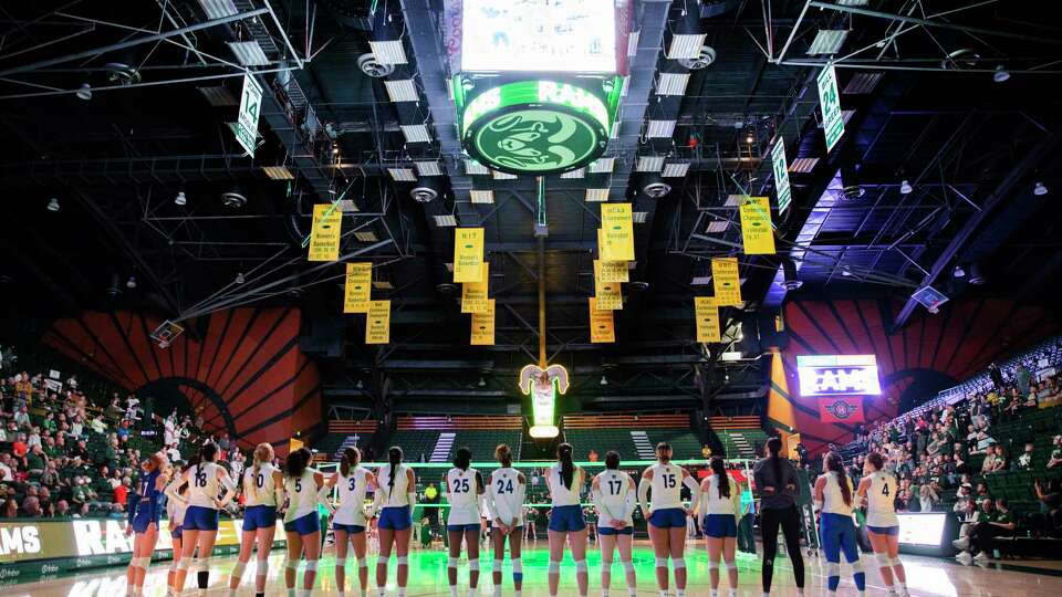 The San Jose State University Spartans line up for the playing of the national anthem and player introductions for their NCAA Mountain West women’s volleyball game against the Colorado State University Rams in Fort Collins, Colo., on Thursday, Oct. 03, 2024.