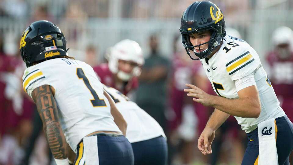 California quarterback Fernando Mendoza (15) shouts instructions to California running back Jaydn Ott (1) at the line of scrimmage in the first half of an NCAA college football game against Florida State in Tallahassee, Fla., Saturday, Sept. 21, 2024. (AP Photo/Mark Wallheiser)