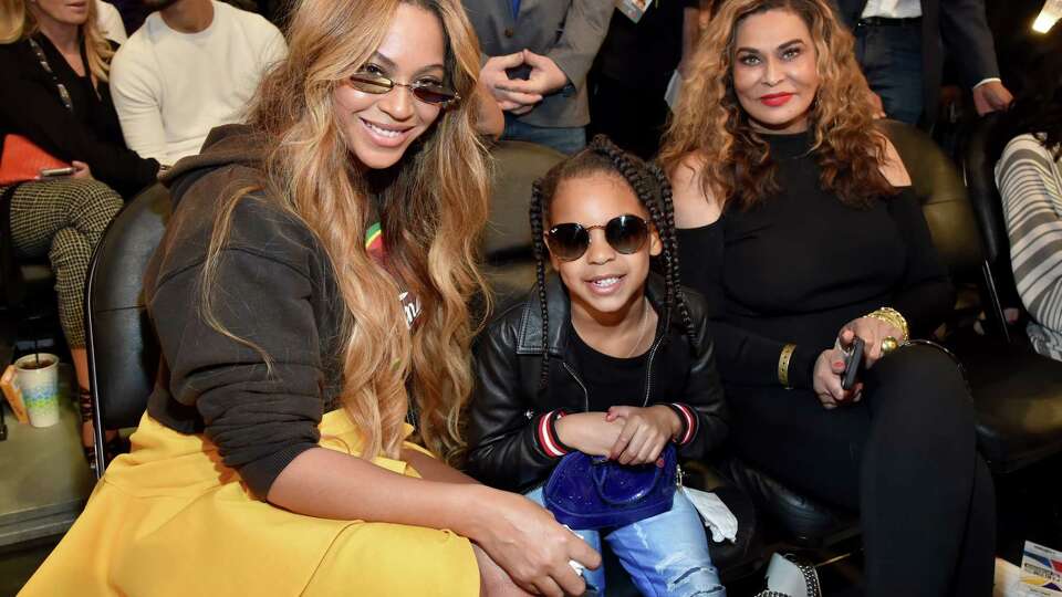 Beyonce, Blue Ivy Carter, and Tina Knowles Lawson attend the NBA All-Star Game at Staples Center in 2018.