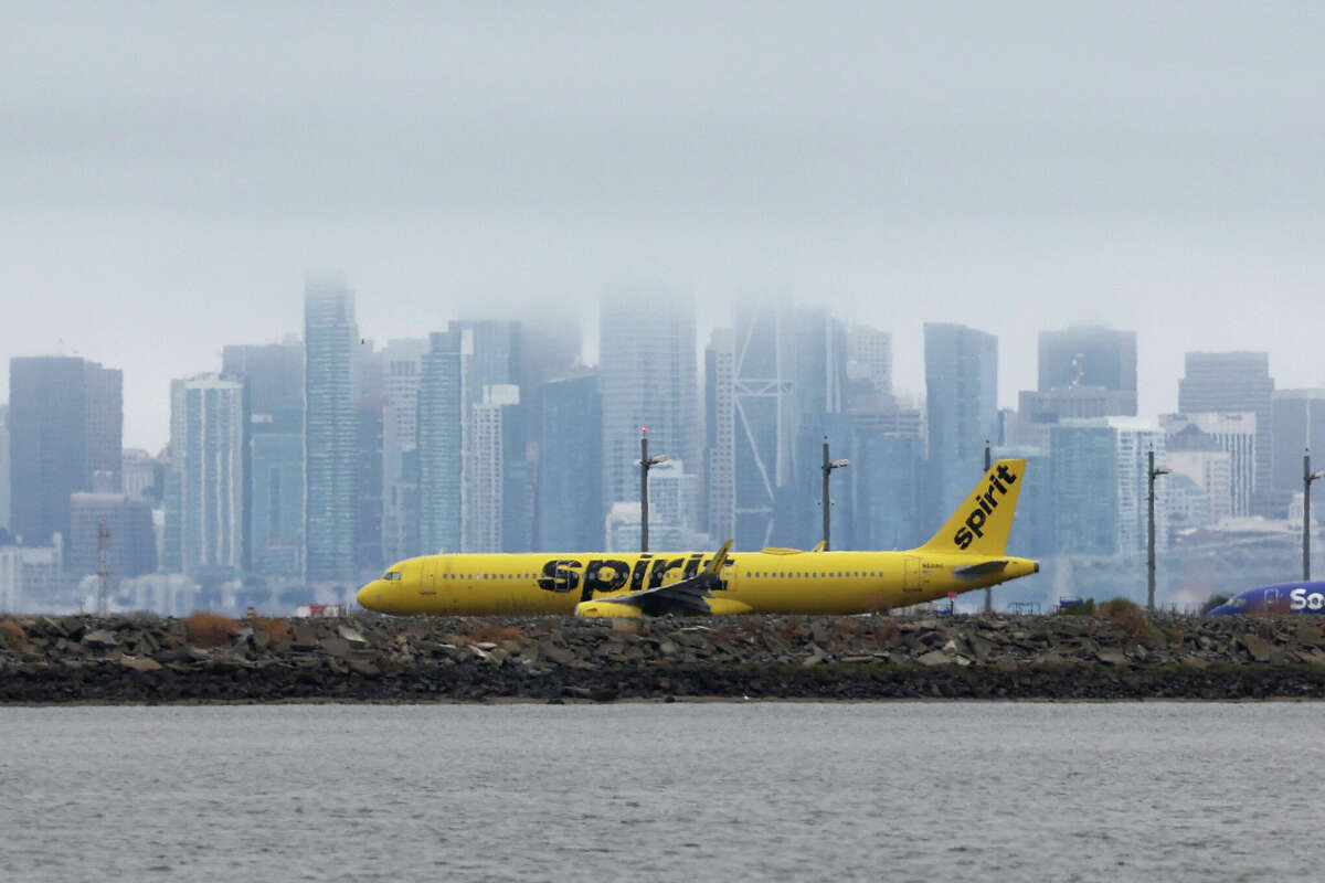 FILE - A Spirit Airlines plane prepares to take off from Oakland International Airport on July 28, 2022 in Oakland, California.