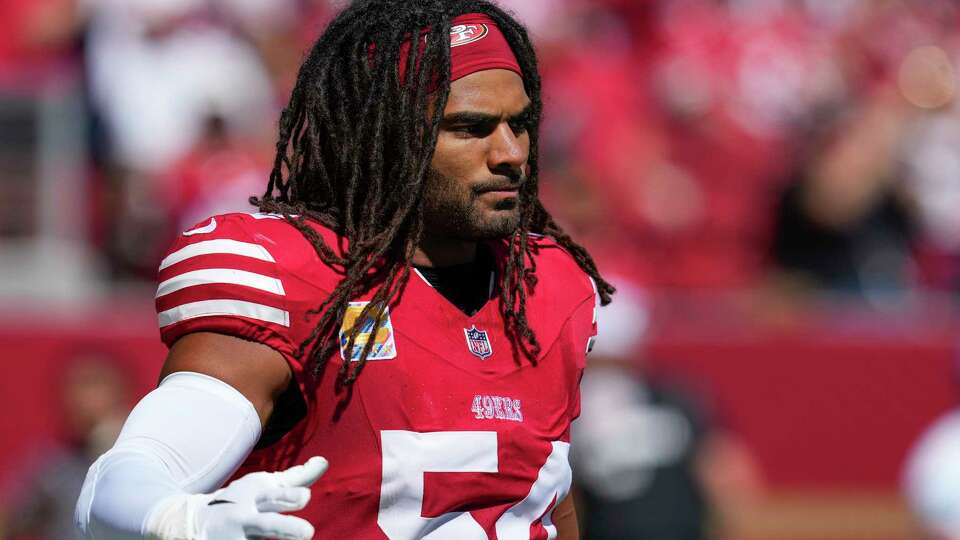 San Francisco 49ers linebacker Fred Warner stands on the field before an NFL football game against the New England Patriots, Sunday, Sept. 29, 2024, in Santa Clara, Calif. (AP Photo/Godofredo A. Vásquez)