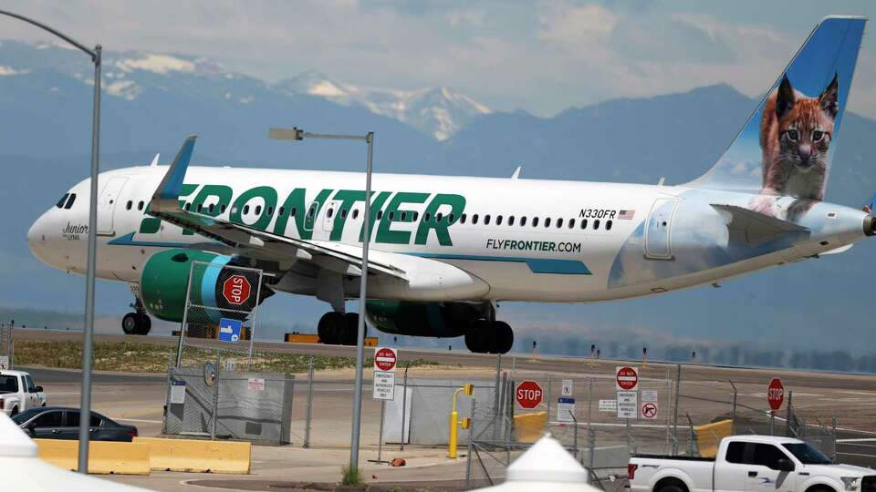 FILE - In this June 10, 2020 file photo, a Frontier Airlines jet heads down a runway for take off from Denver International Airport as travelers deal with the effects of the new coronavirus in Denver. Frontier Airlines says its hopes to gross about $630 million by selling some of its stock to the public. The discount airline said in a regulatory filing Tuesday, March 23, 2021, that it expects to sell 30 million shares at between $19 and $21 per share. (AP Photo/David Zalubowski, File)