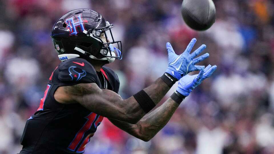 Houston Texans wide receiver Nico Collins (12) catches a 67-yard touchdown pass from quarterback C.J. Stroud during the first half of an NFL football game Sunday, Oct. 6, 2024, in Houston.