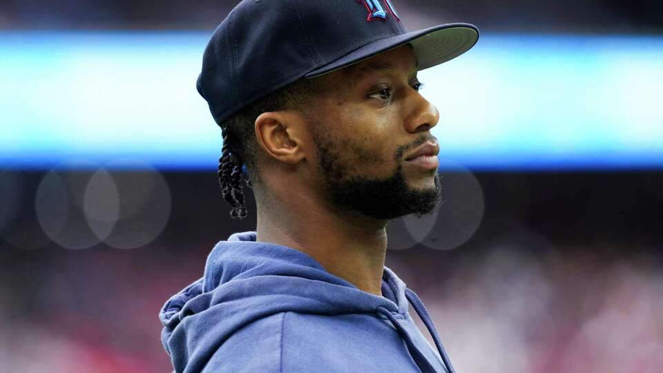 Houston Texans running back Joe Mixon is seen on the sideline during the first half of an NFL football game Sunday, Oct. 6, 2024, in Houston.