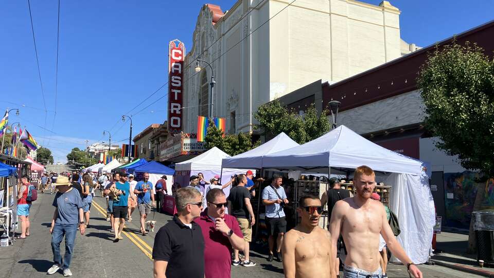 Castro Street Fair patrons battle the Sunday morning heat