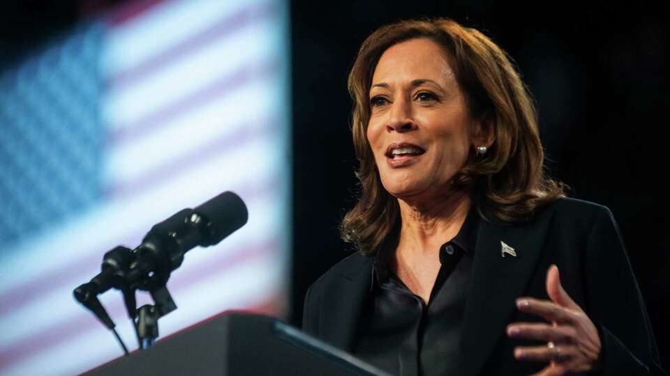 Vice President Kamala Harris addresses supporters during a rally on Friday, Oct. 4, 2024, at Dort Financial Center in Flint, Michigan.