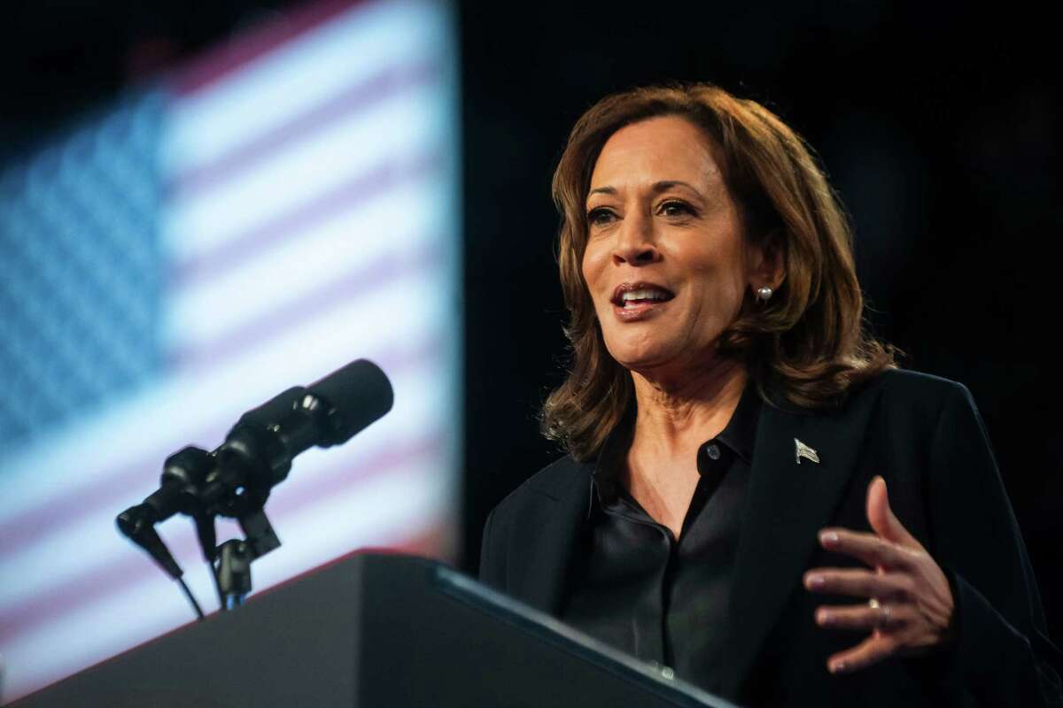 Vice President Kamala Harris addresses supporters during a rally on Friday, Oct. 4, 2024, at Dort Financial Center in Flint, Michigan.