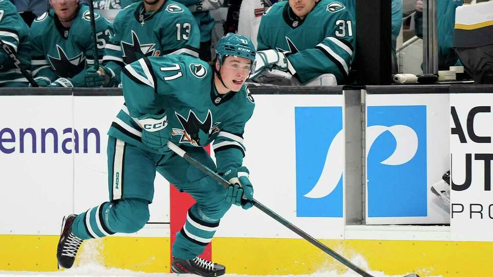 SAN JOSE, CALIFORNIA - SEPTEMBER 22: Macklin Celebrini #71 of the San Jose Sharks skates up ice with control of the puck against the Vegas Golden Knights during the first period at SAP Center on September 22, 2024 in San Jose, California.