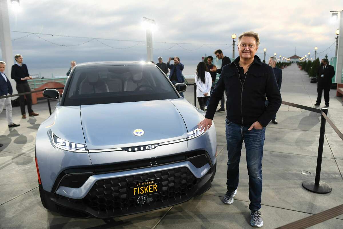 Henrik Fisker stands with the Fisker Ocean electric vehicle after it was unveiled on November 16, 2021 in Manhattan Beach, California. The car received poor reviews and faced multiple recalls.