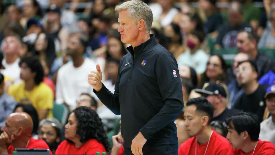 HONOLULU, HAWAII - OCTOBER 5: Head coach Steve Kerr of the Golden State Warriors gives a thumbs up to his players during the first half of an exhibition game against the LA Clippers at SimpliFi Arena on October 5, 2024 in Honolulu, Hawaii. NOTE TO USER: User expressly acknowledges and agrees that, by downloading and or using this photograph, User is consenting to the terms and conditions of the Getty Images License Agreement.