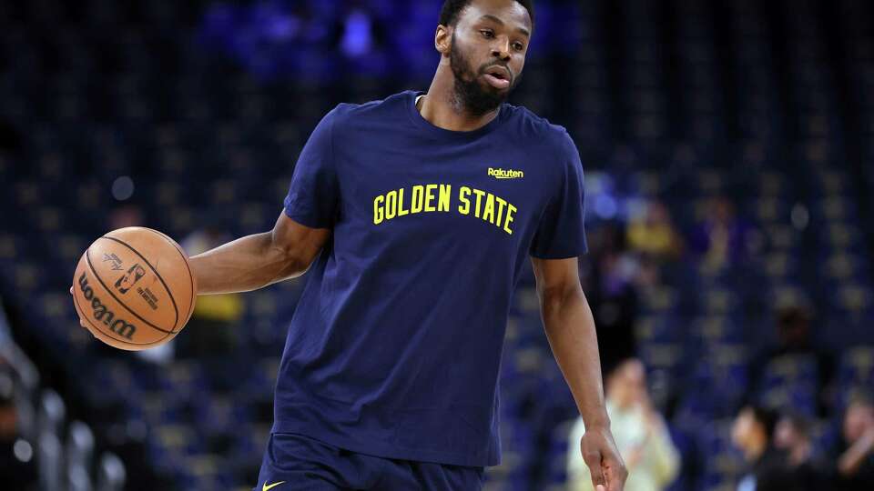 Golden State Warriors’ Andrew Wiggins warms up before playing Los Angeles Lakers in NBA game at Chase Center in San Francisco on Thursday, February 22, 2024.