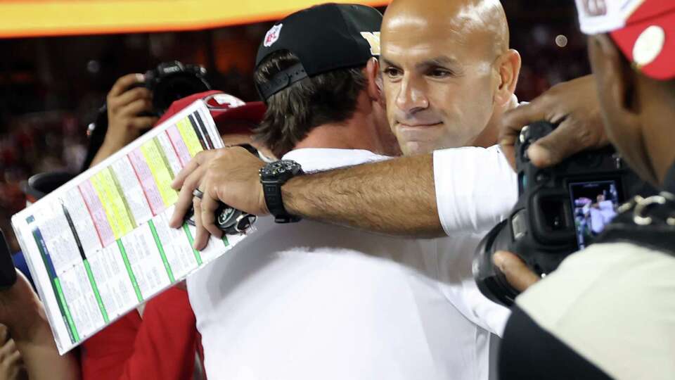 New York Jets’ head coach Robert Saleh embraces San Francisco 49ers’ head coach Kyle Shanahan after Niners’ 32-19 win during NFL game at Levi’s Stadium in Santa Clara, Calif., on Monday, September 9, 2024.