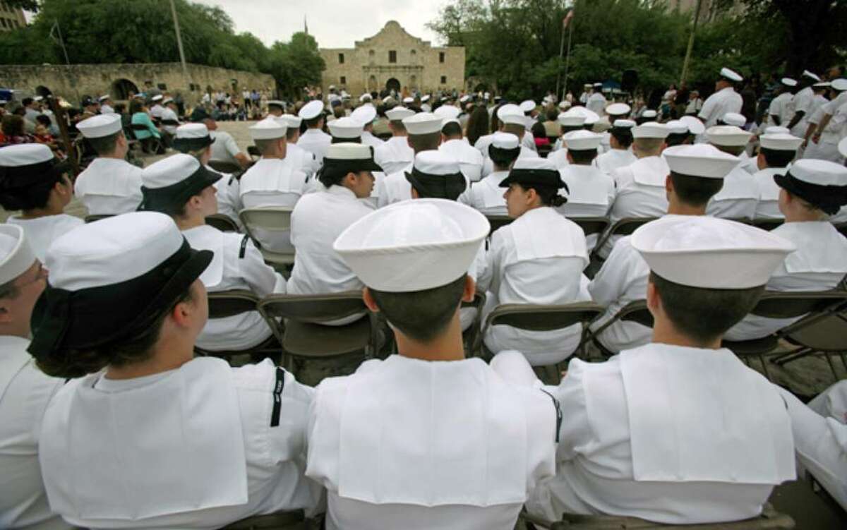 Alamo Plaza is a sea of white caps and uniforms for the annual Navy Day ceremony during Fiesta.