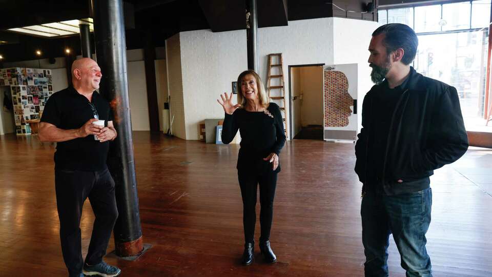 Jerry Cimino, left to right, co-founder and curator Counterculture Museum; Estelle Cimino, co-founder and executive director Counterculture Museum and Brandon Loberg, art director Counterculture Museum, talk as they stand in the main gallery space for the Counterculture Museum on Tuesday, October 8, 2024 in San Francisco, Calif. Jerry and Estelle Cimino are the founders of the Beat Museum in North Beach.