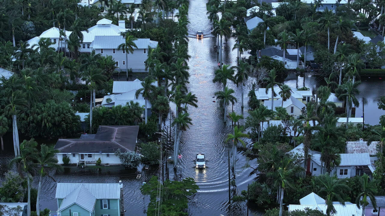 In this aerial view, Flood waters inundate a neighborhood after Hurricane Milton came ashore on October 10, 2024, in Punta Gorda, Florida. The storm made landfall as a Category 3 hurricane in the Siesta Key area of Florida, causing damage and flooding throughout Central Florida. (Photo by Joe Raedle/Getty Images)