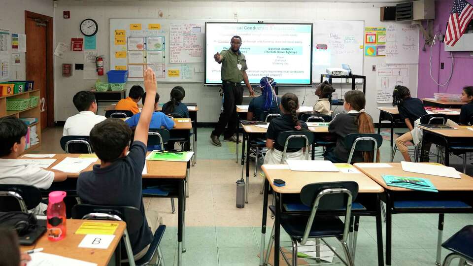 Fourth grade science teacher Paul Obakpolo during a tour of Benavidez Elementary School on Thursday, Oct. 10, 2024, in Houston.