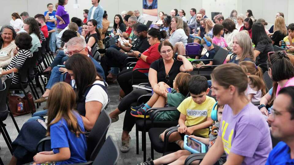 More than 163 people signed up to speak during the public comment portion of a Houston ISD board of managers at the Hattie Mae White Educational Support Center, Thursday, Oct.10, 2024, in Houston.