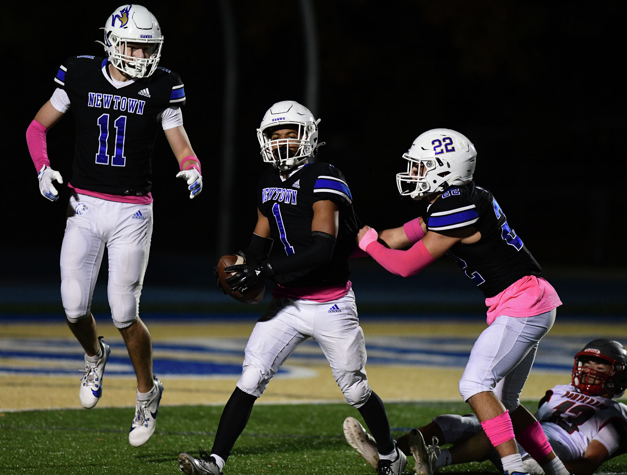 Newtown High School football vs. Pomperaug photos
