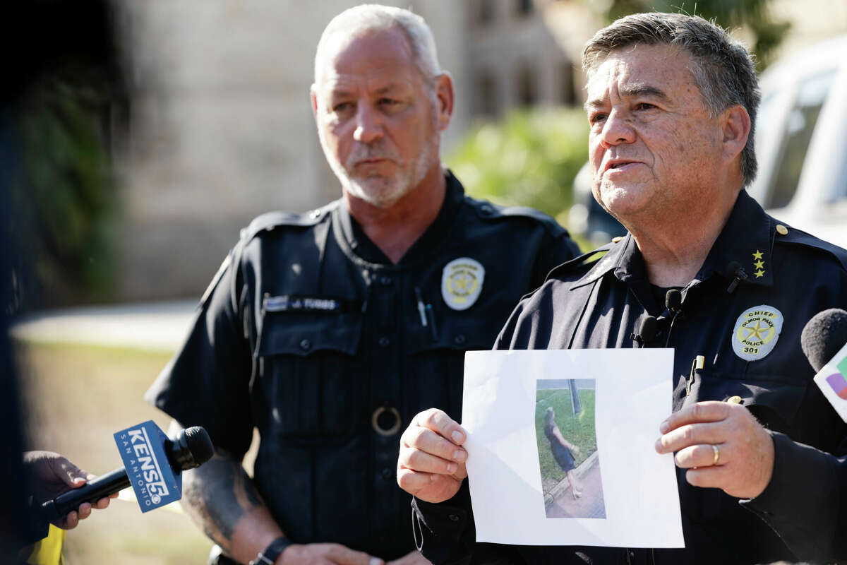 Olmos Park Police Chief Fidel Villegas holds up a photo of Suzanna Simpson from a security camera during a press conference on Thursday, Oct. 10, 2024, in Olmos Park, Texas.